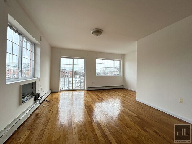 Building Photo - 3BR/2BA with TWO BALCONIES & Great Closet ...