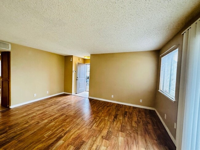 Building Photo - Downstairs Corner 2-Bedroom Condo in Centr...