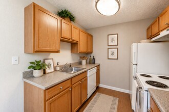 A Standard Kitchen at Greentree Village Apartments - Greentree Village Apartments