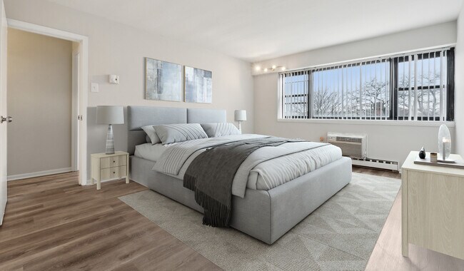 Dormitorio espacioso con abundante luz natural - Vista Apartment Homes