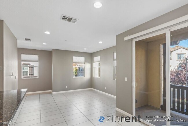 Building Photo - 2 br, 2.5 bath Condo - 2004 Anemone Way, S...