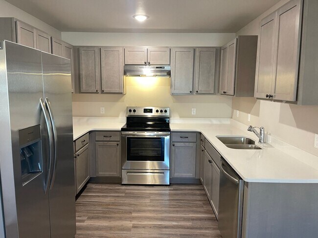 Building Photo - NEW SENIOR COMMUNITY! 55 & UP! 2 bed 2 ful...