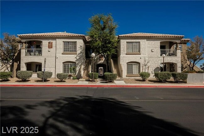 Building Photo - Stylish & Updated Condo with 2-Car Garage ...