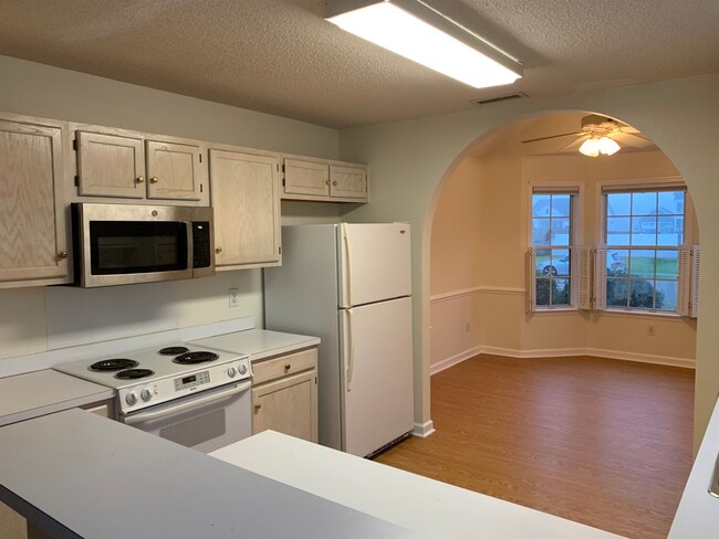 Kitchen and dining room - 1079 Wayfarer Ln