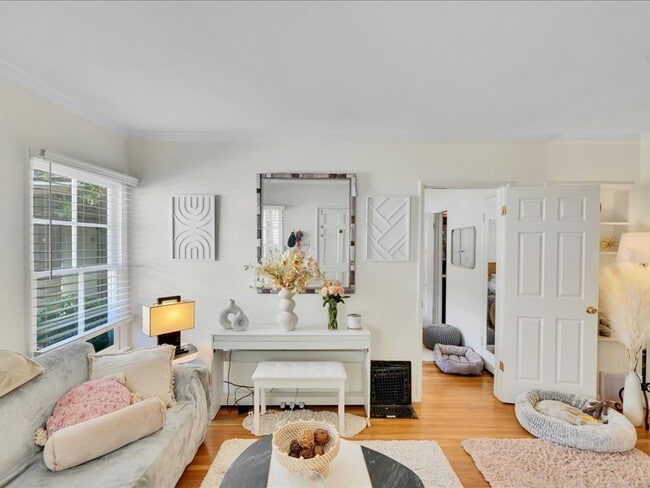 Hardwood floors and newer tile floors throughout - 4266 Troost Ave