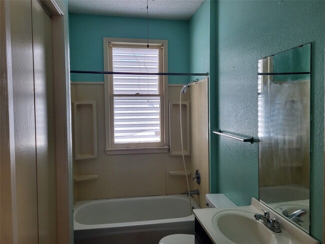 Building Photo - 4401 Ave Q 1/2