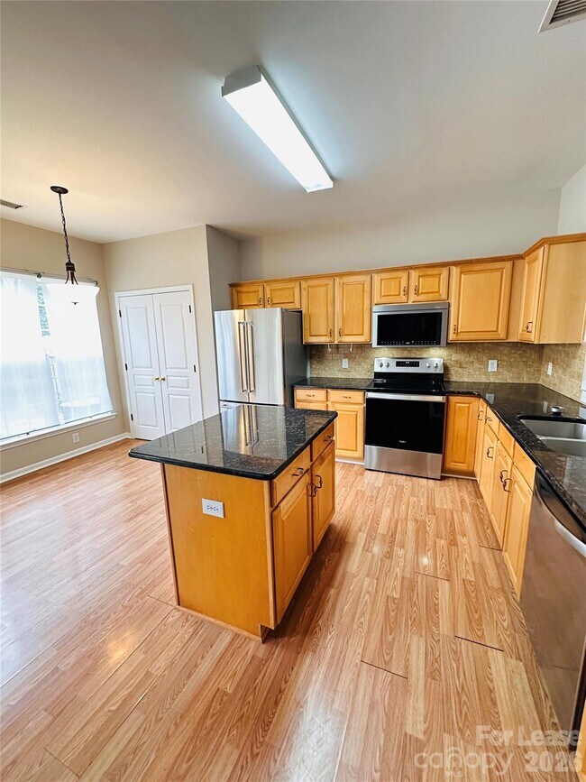 Foto del edificio - 8419 Heron Glen Dr