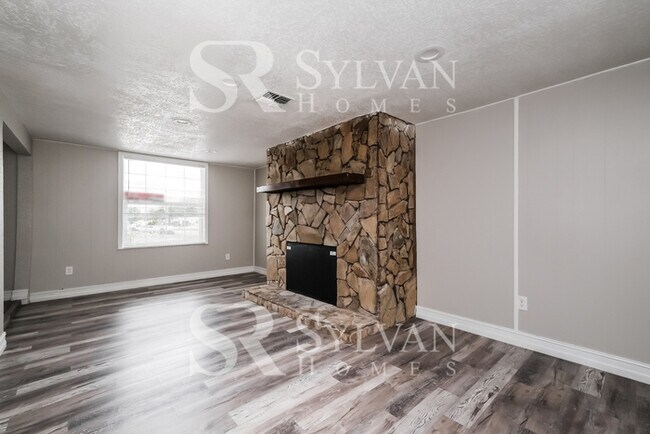 Building Photo - You Can Afford to Dwell Well.