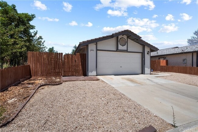 WEST FRONT - 9951 Pebble Beach Dr