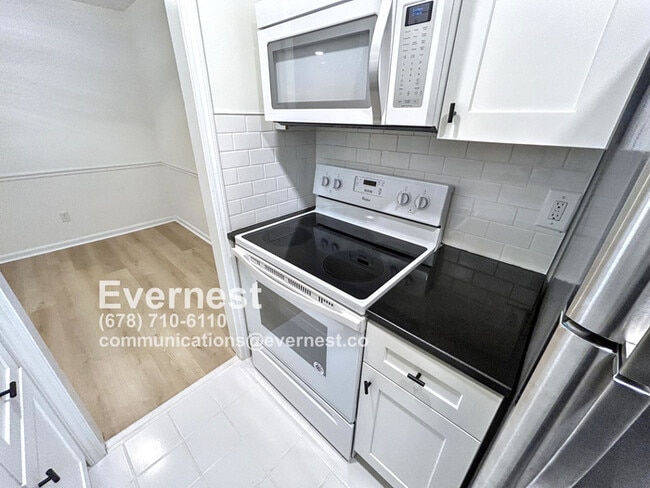 Building Photo - Cozy 1-Bedroom Apartment with Modern Ameni...