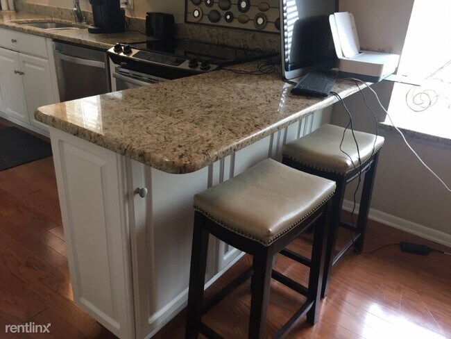 Foto del edificio - 2 br, 1 bath Condo - 6130 Carroll Lake Rd