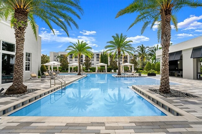 Amenities include resort-style saltwater pool and cabanas. - The District Boynton
