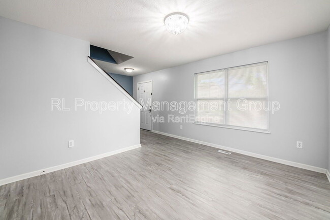 Building Photo - 5766 Little Red Rover St