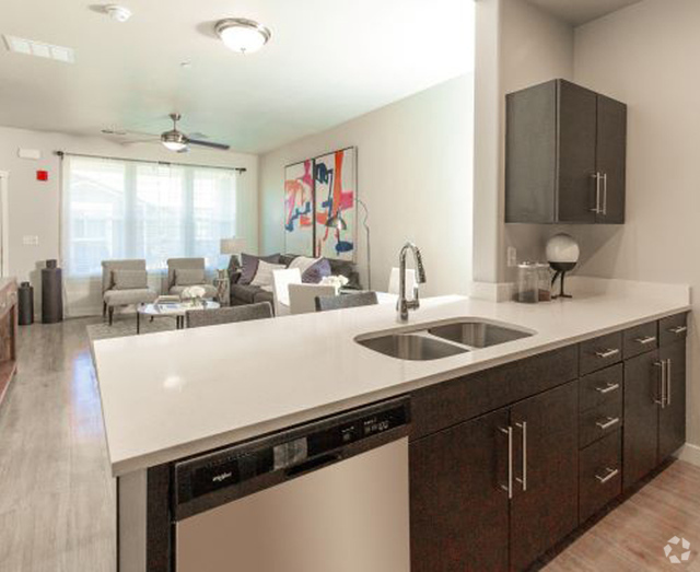 Modern Kitchen With Custom Cabinet - Parc on Center Apartments & Townhomes