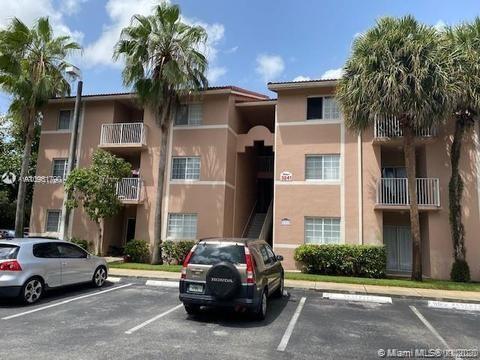 Building Photo - 3241 Sabal Palm Manor