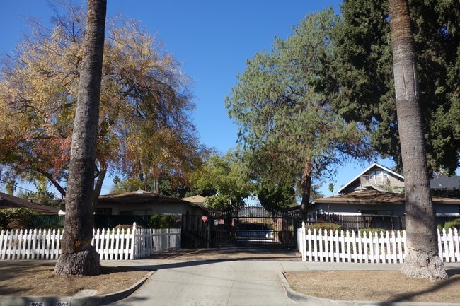 Building Photo - Village of Roses LLC