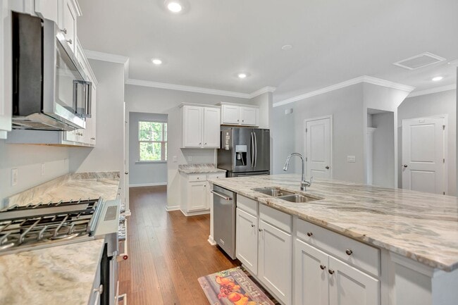 Building Photo - Welcome to The Ponds, a community epitomiz...