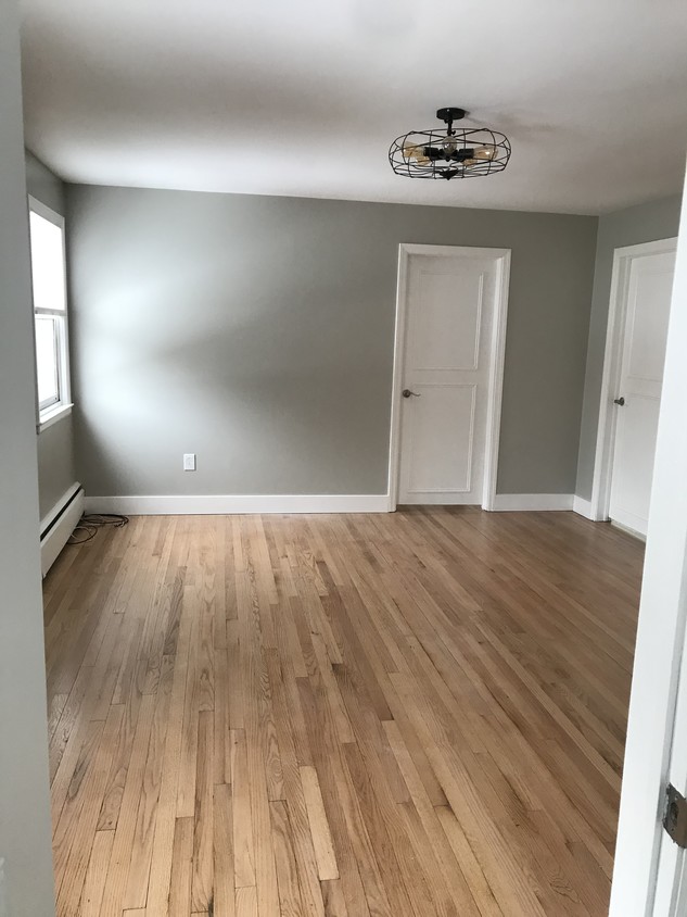 Large family room. Newly finished hardwood - 748 Feura Bush Rd