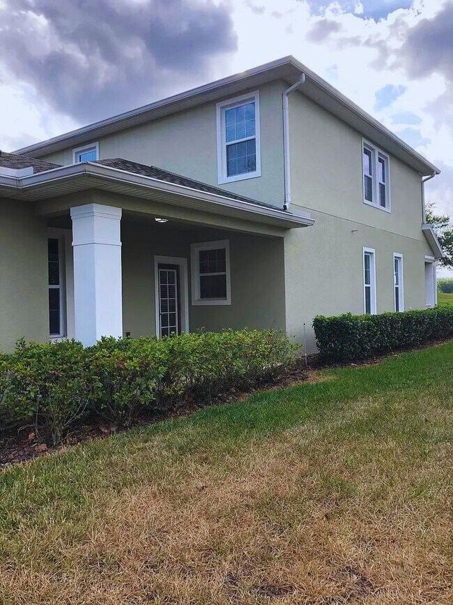 Building Photo - Spacious 4-Bedroom Townhome in Harmony – A Perfect Blend of Nature & Comfort!