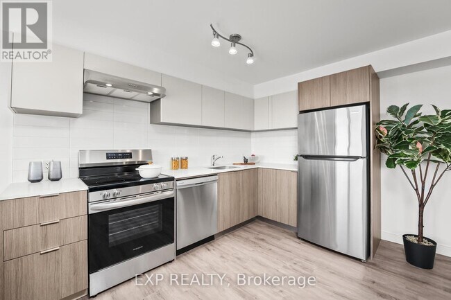 Building Photo - 100-100 Manett Crescent