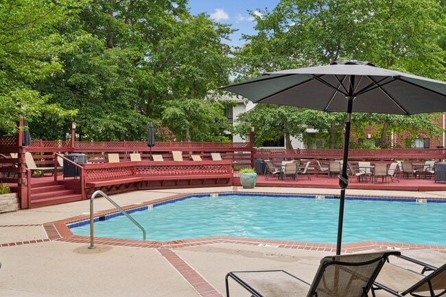 Pool & Sundeck with Outdoor Seating and Lounge Chairs - Rolling Brook Village