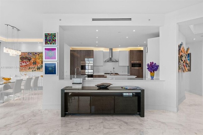 Building Photo - 10295 Collins Ave