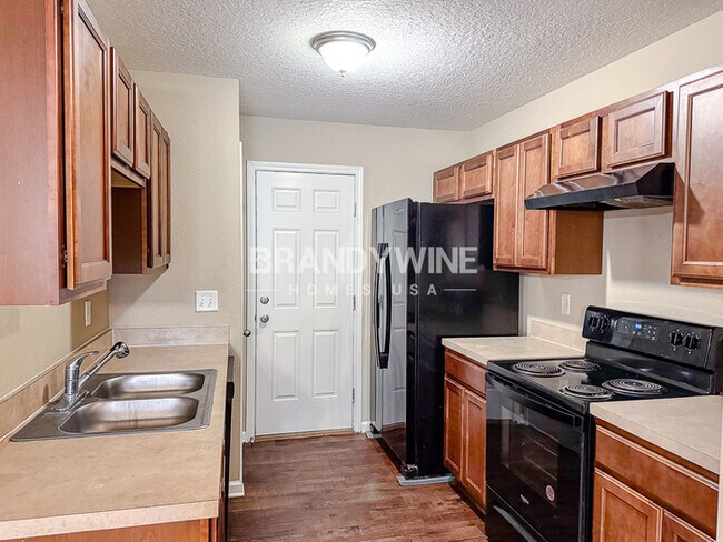 Building Photo - New Beginnings Await: Your Perfect Home fo...