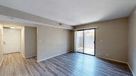Located at 6413 Tupelo Dr in Citrus Heights, CA, this 2-bedroom, 2-bathroom single-floor unit offers a well-organized layout with a thoughtful mix of materials and finishes throughout. The living room is bright and open, featuring wood-look laminate flooring, a ceiling fan, and a sliding glass door that leads to a private patio, allowing natural light to fill the space. The kitchen is well-appointed with white shaker-style cabinetry, granite-look countertops, stainless steel appliances including a range, dishwasher, and refrigerator, and durable wood-look flooring that extends seamlessly through the common areas. Both bedrooms are carpeted for comfort and include windows with blinds that allow for natural light and privacy. The primary bedroom features a mirrored sliding-door closet, adding a sense of depth to the room. Each bathroom is finished with white cabinetry, granite-look countertops, and a shower/tub combination. One bathroom includes wood-look flooring and a lighted vanity mirror, while the other offers a similarly clean and functional design. Neutral tones in warm beige and gray are carried throughout the unit, creating a cohesive and understated aesthetic.