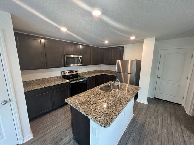 Building Photo - 2 car garage townhome-5310 Companion Lane ...