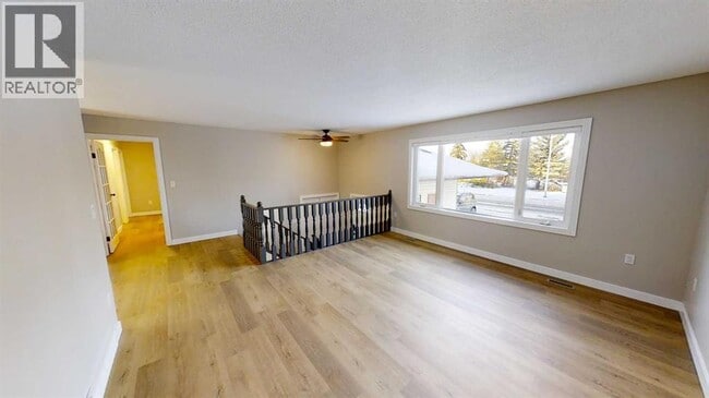 Photo du bâtiment - 9533-9563 63 Ave