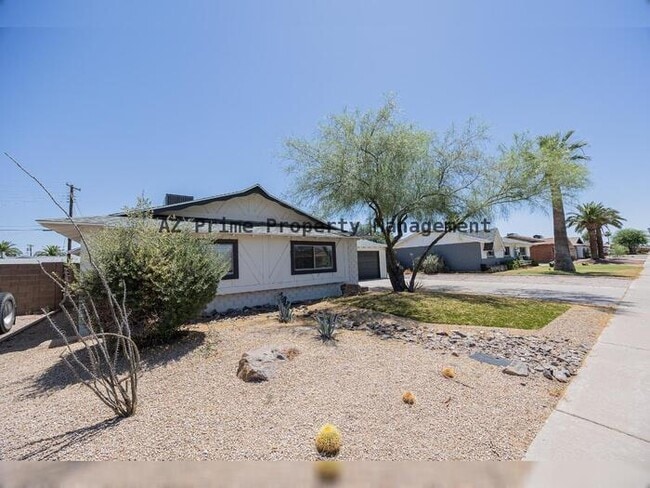 Foto del edificio - 8447 E Lewis Ave