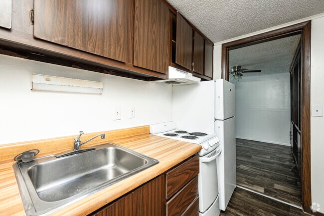 1BR, 1BA - 576SF -Kitchen - Camellia Court Apartments
