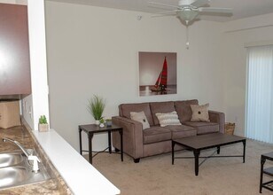 Living room with furniture included - Hi Vine by Weida Apartments