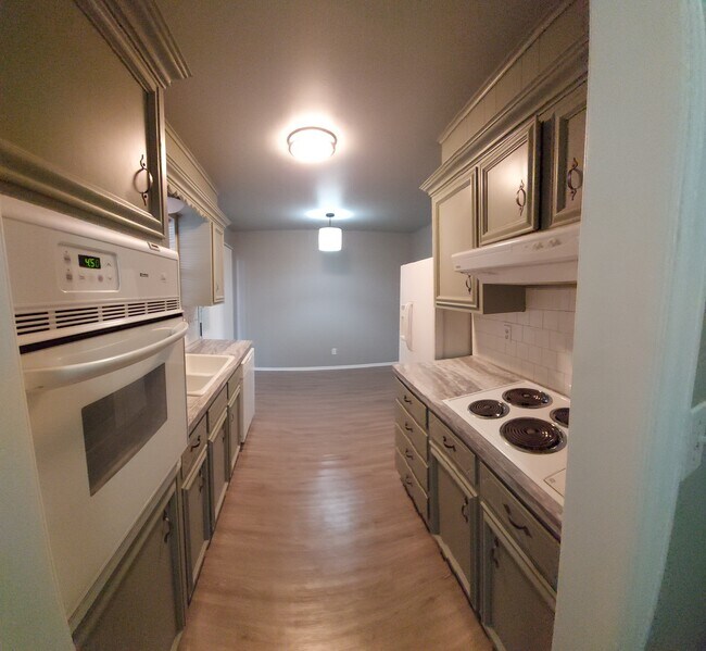 Kitchen from laundry room - 5822 E 35th St