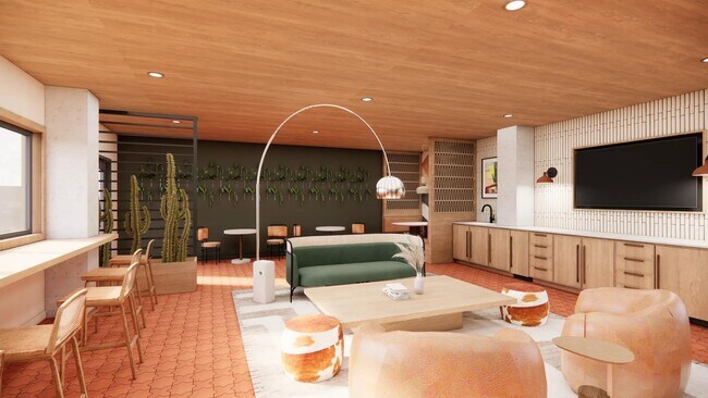 Salón con espacio de reunión, asientos cómodos y tejo en Modera Rio Salado en Tempe, AZ. - Modera Rio Salado