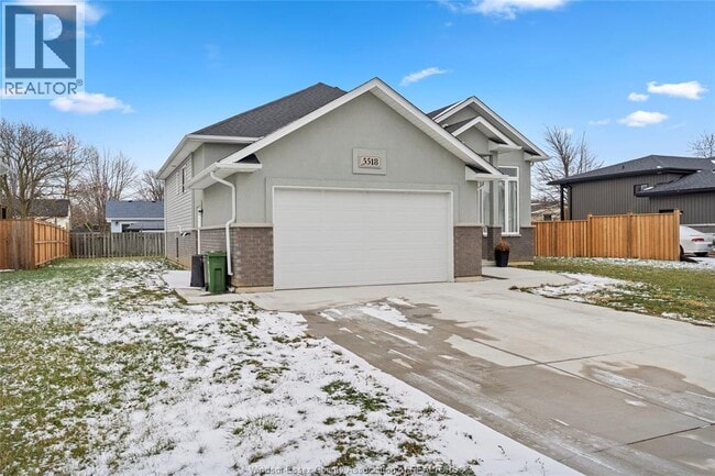 Photo du bâtiment - 5518 Nostadt Cres