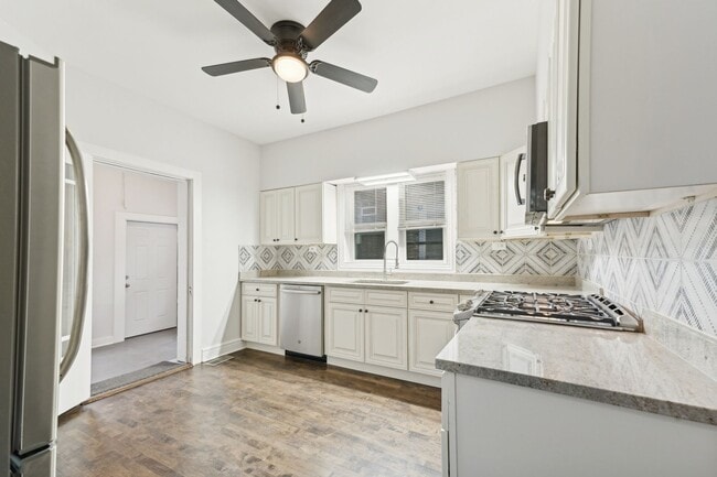 Building Photo - 8423 S Colfax Ave