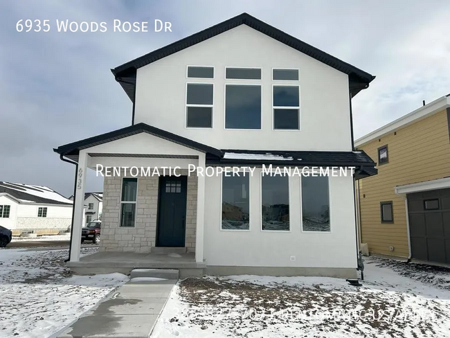 Foto del edificio - 6935 Woods Rose Dr