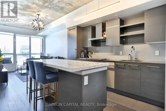 Building Photo - 1030 King St W