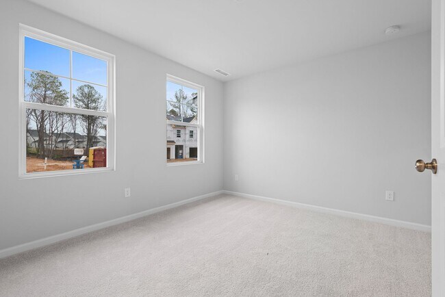 Building Photo - BRAND NEW! - Spacious 3 Story Townhome- Lo...