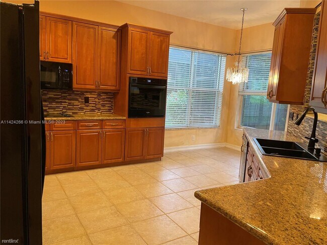 Building Photo - 4 br, 3 bath House - 7009 NW 113th Ave # 7009