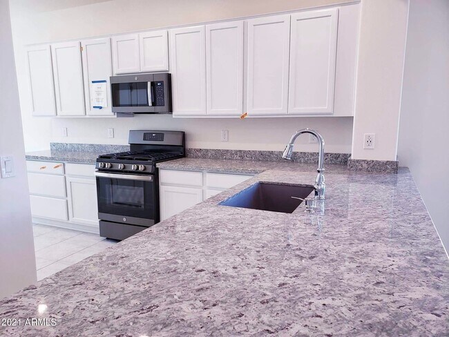 Building Photo - 5418 W Country Garden Ln