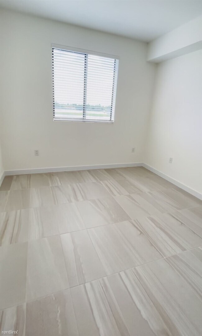Building Photo - 1 br, 1 bath Condo - 7321 NW 46th St NEW B...