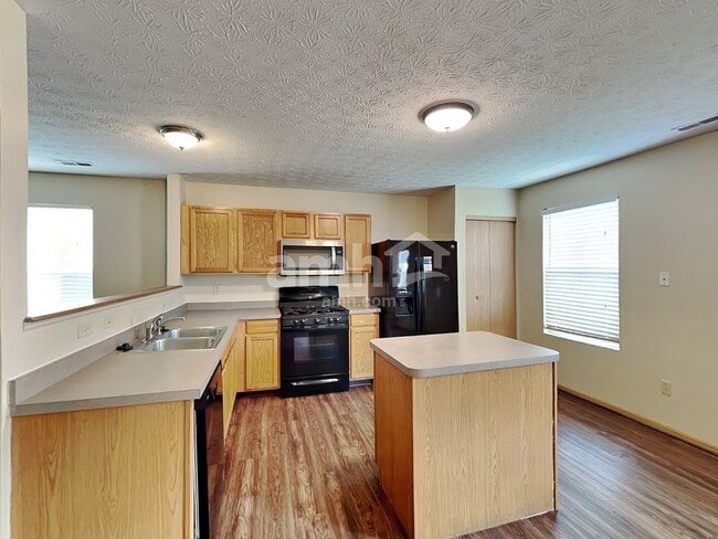 Building Photo - 7468 Hemrich Dr