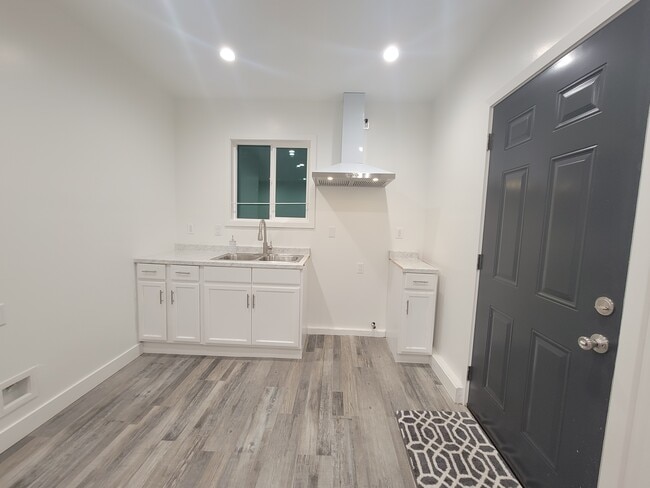 Kitchen & Livigroom. Stove will be included. - 13738 Eldridge Ave