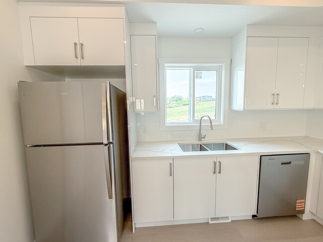 Photo du bâtiment - 277 Sage Hill Cir NW