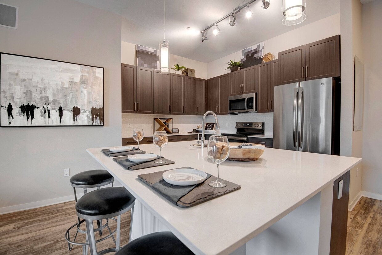 Park on Central Kitchen with hardwood floors, kitchen table and stainless steel appliances - Park on Central