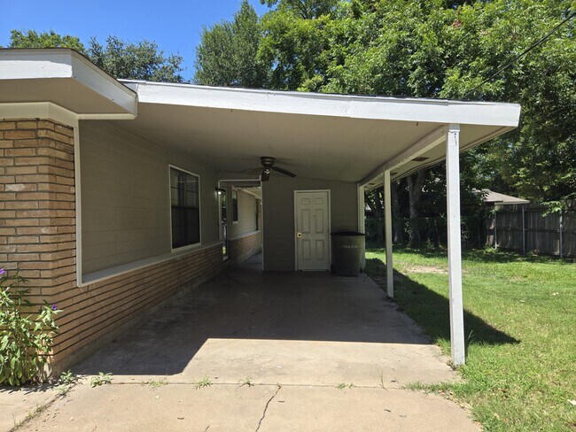 carport with utility room with washer & dryer connection - 900 E 27th St