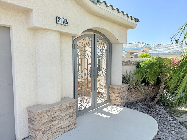 Building Photo - Spacious 4-Bedroom Home with Pool & Spa in...