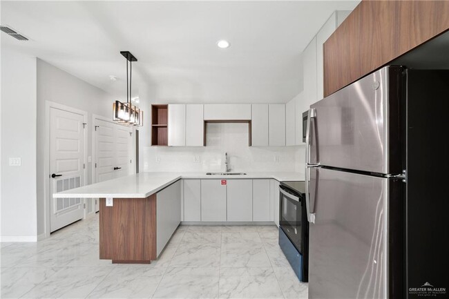 Foto del edificio - 905 W 8th St